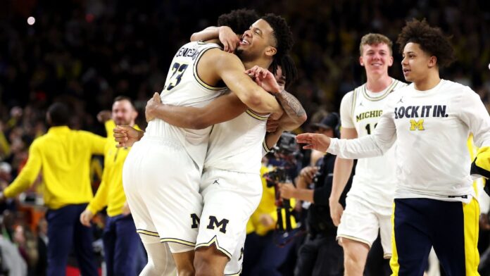 Michigan holds off UConn to win second NCAA hoops title