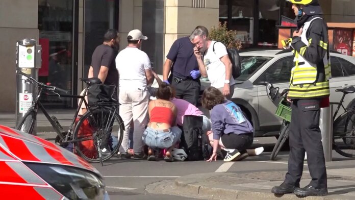 Car plows into pedestrian zone killing 2 as police detain driver and investigate motive