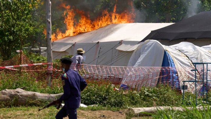 Ebola treatment center set on fire in Congo after residents clash with authorities over victim's body