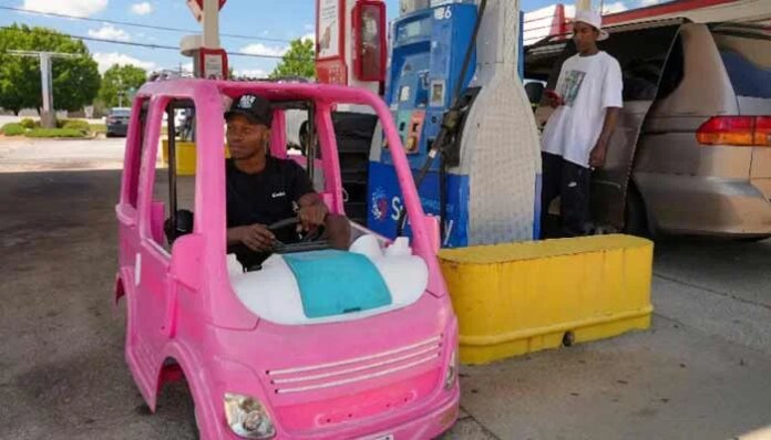 High gas prices spur Americans to improvise, from bus rides to toy cars 