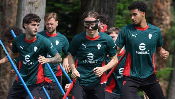 Masked Modric back to aid Pulisic, Milan's Champions League push