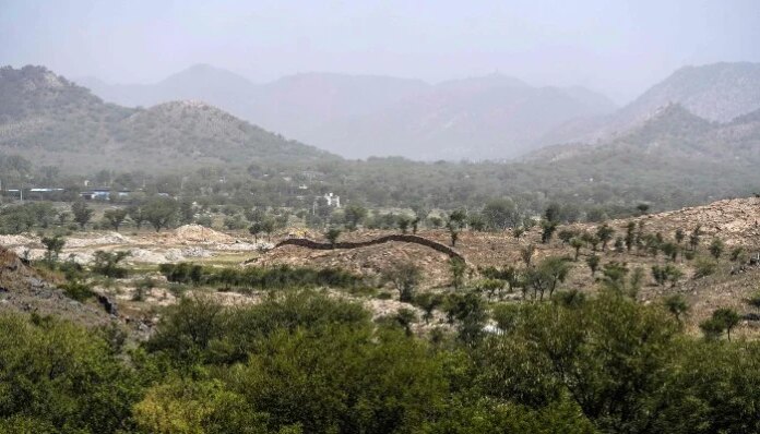 Mining turns India's heat-shield hills to dust