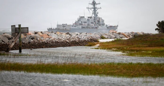 U.S. strikes 2 Iranian ports as American warships come under fire