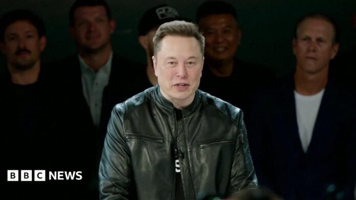 Elon wears a black leather jacket while speaking ahead of the SpaceX IPO.