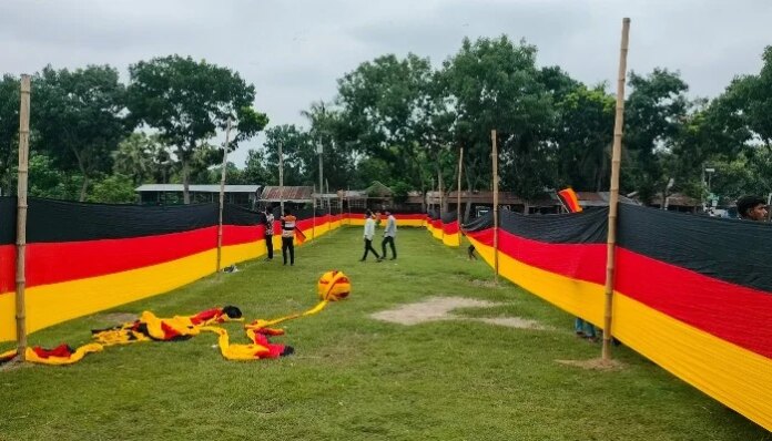 Bangladesh farmer unfurls vast Germany banner to show World Cup support