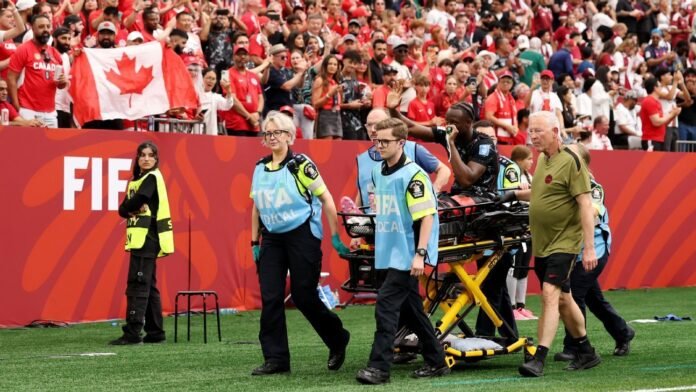Canada's Ismaël Koné stretchered off with a broken leg