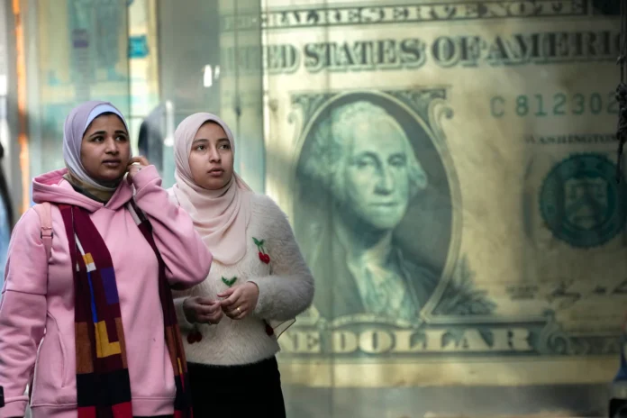 Dollar hits 13-month high as foreign investors overlook worries about Trump