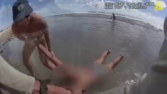Florida deputy drags 'unresponsive' beachgoer from ocean in dramatic rescue