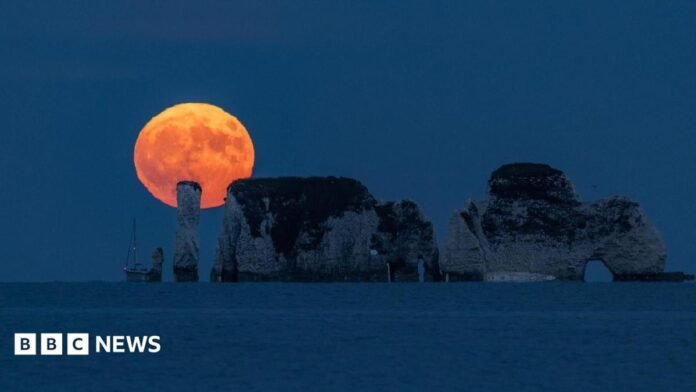Strawberry Moon rising - taken from Swanage, Dorset