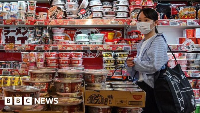 Japan raises interest rate to highest since 1995