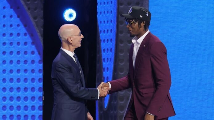 Johnson reunites with Mavs' May, leads U-M trio in draft lottery