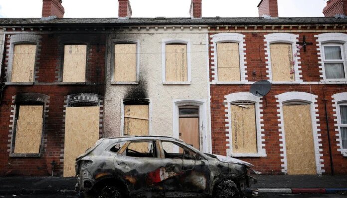 Knife attack victim's family calls for calm after anti-immigrant violence in Belfast