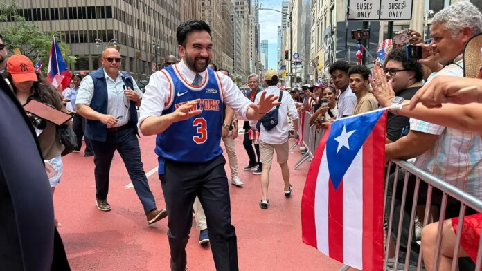 Mamdani parties with Knicks champion Jose Alvarado on Puerto Rican Day Parade float in New York