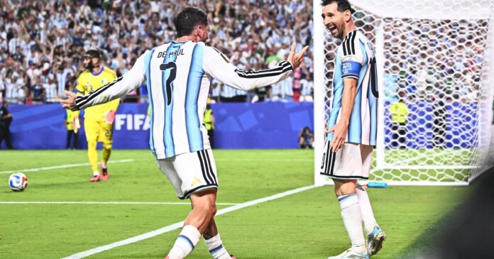 Messi ties men's World Cup goals record with first World Cup hat trick as Argentina tops Algeria
