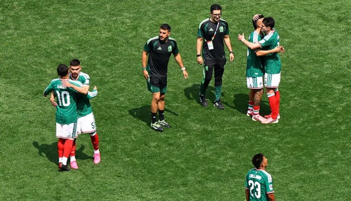 Mexico get World Cup party started with 2-0 win over nine-man South Africa