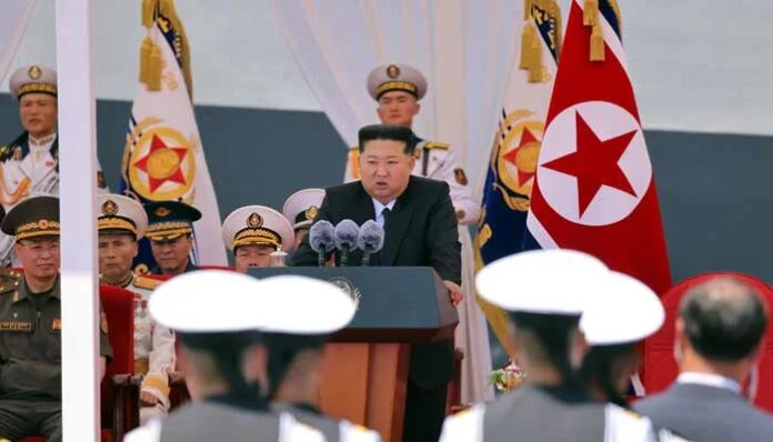North Korea's Kim unveils plans for 10,000-tonne warships, nuclear navy