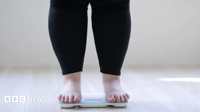 Person standing on scales