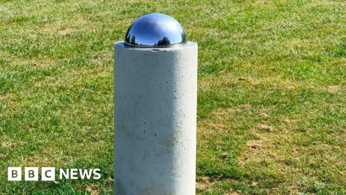 Otford village solar system model shows planets and stars
