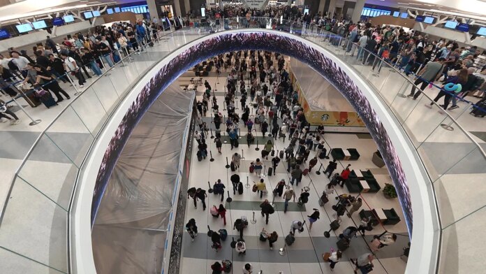 Passenger allegedly boards flight with fake boarding pass, forcing plane back to gate