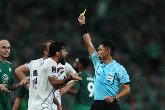 Shut out of the World Cup again, China roots for a referee
