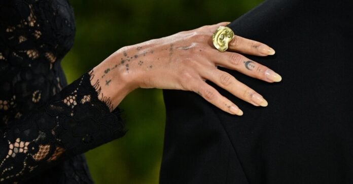 When Did Bare Nails Become a Status Symbol?