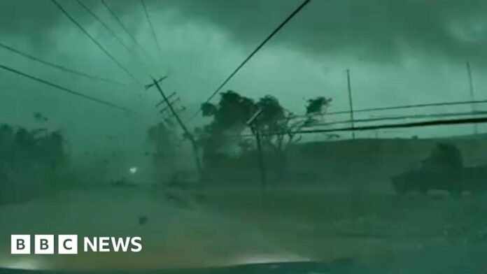 A power line is on the ground after a tornado.