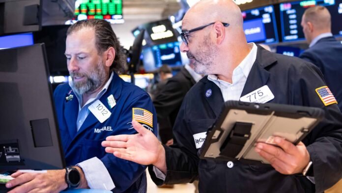 Dow hovers at 53,000 as chip stock weakness holds back market: Live updates