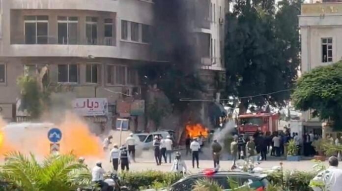 Explosions heard in Damascus during France president visit, says security source