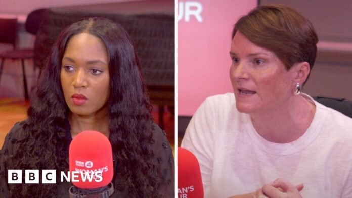 Two women speak into red microphones.