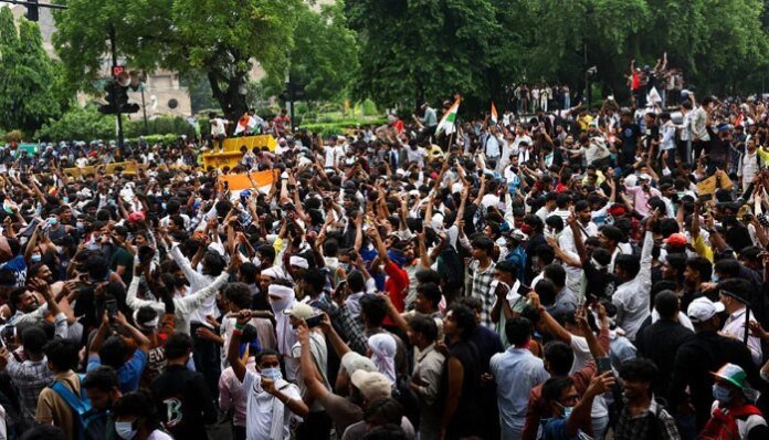 India activists demand release of detained 'cockroach' protesters