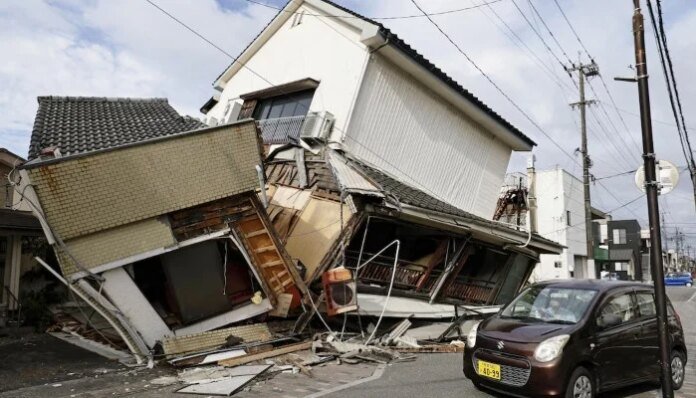 Japan quake toll rises to 13 as rescuers haul people from collapsed mall