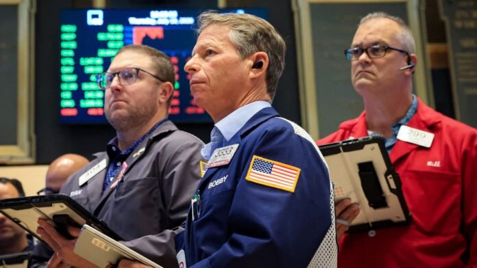 S&P 500 falls nearly 1%, heads for losing week, led by chipmakers; Netflix plunges: Live updates