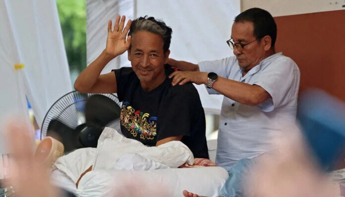 Wife says India illegally detaining hunger strike activist