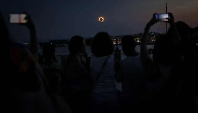 In pictures: Millions watch in wonder as solar eclipse plunges Spain into darkness