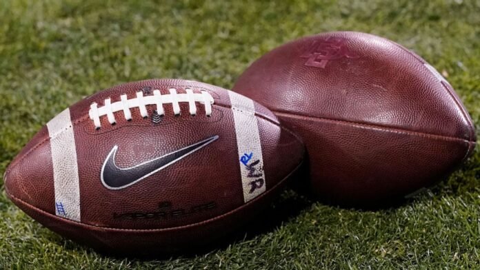 Judge says injunction doesn't cover football players who signed pro deals