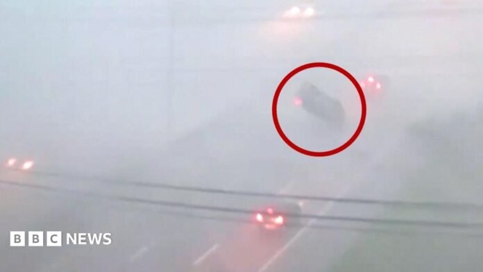 Image shows vehicle flipped due to storms in Ohio.