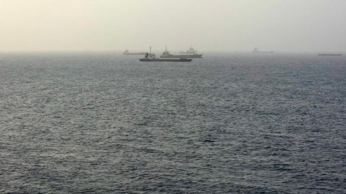 Tankers near Oman come under fire as Iran threatens to choke off shipping routes