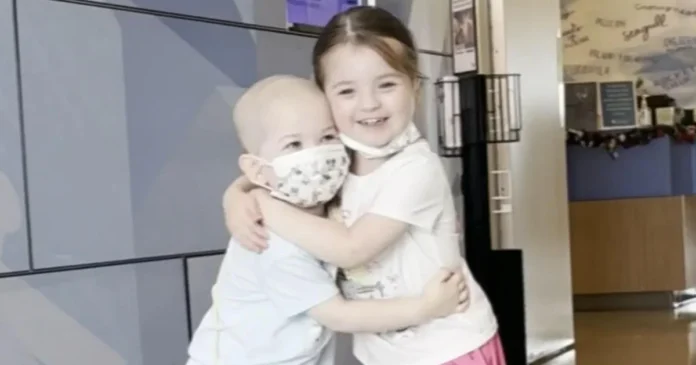 Touching video shows toddler twins hugging after one of them faced cancer treatment