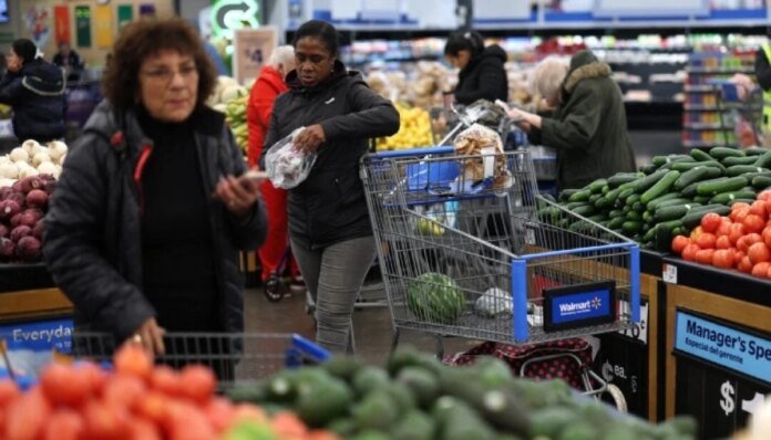 US inflation slows again as gas and grocery prices fall in July